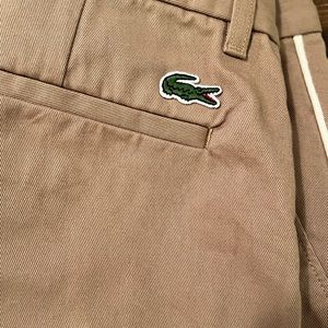 Lacoste tan chino’s with off white seam line size s22